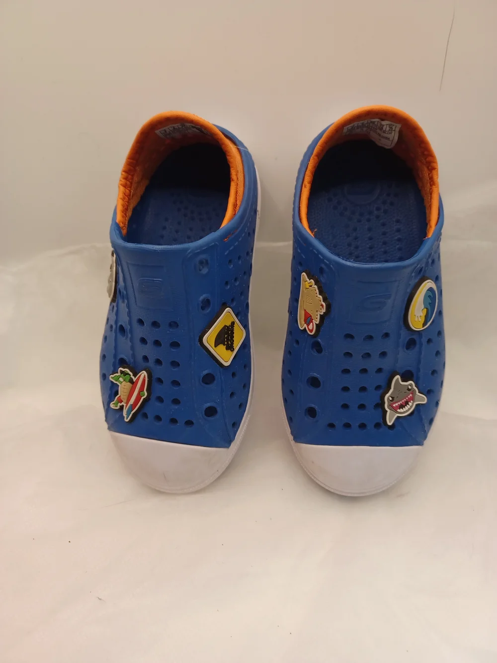 Skeachers Kids Blue Slip-On Clogs with Fun Charms